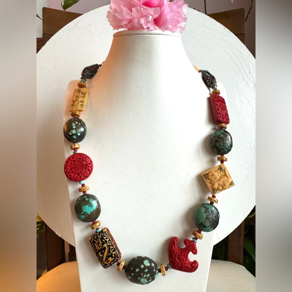 Stunning antique necklace with rare turquoise,cinnabar and yak bone carving 26”